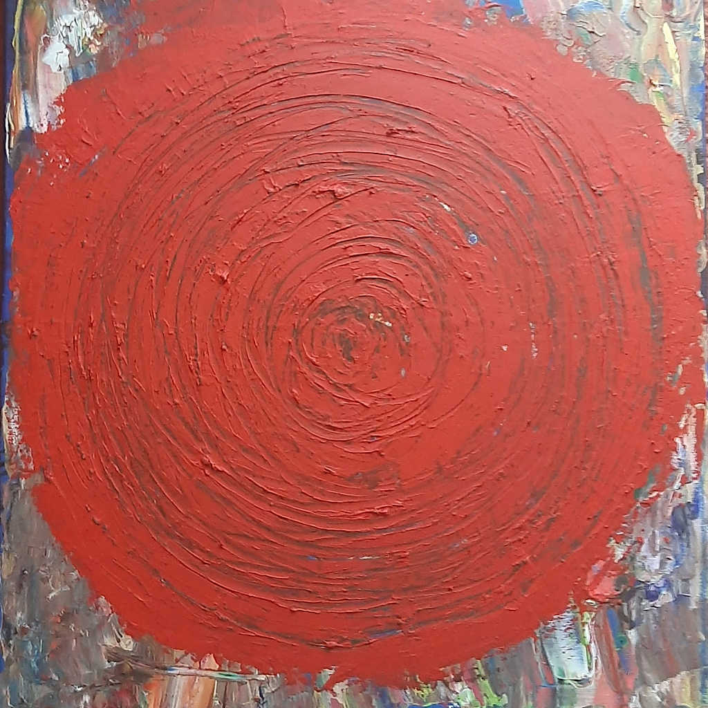 Czerwona kula na kolorowym tle